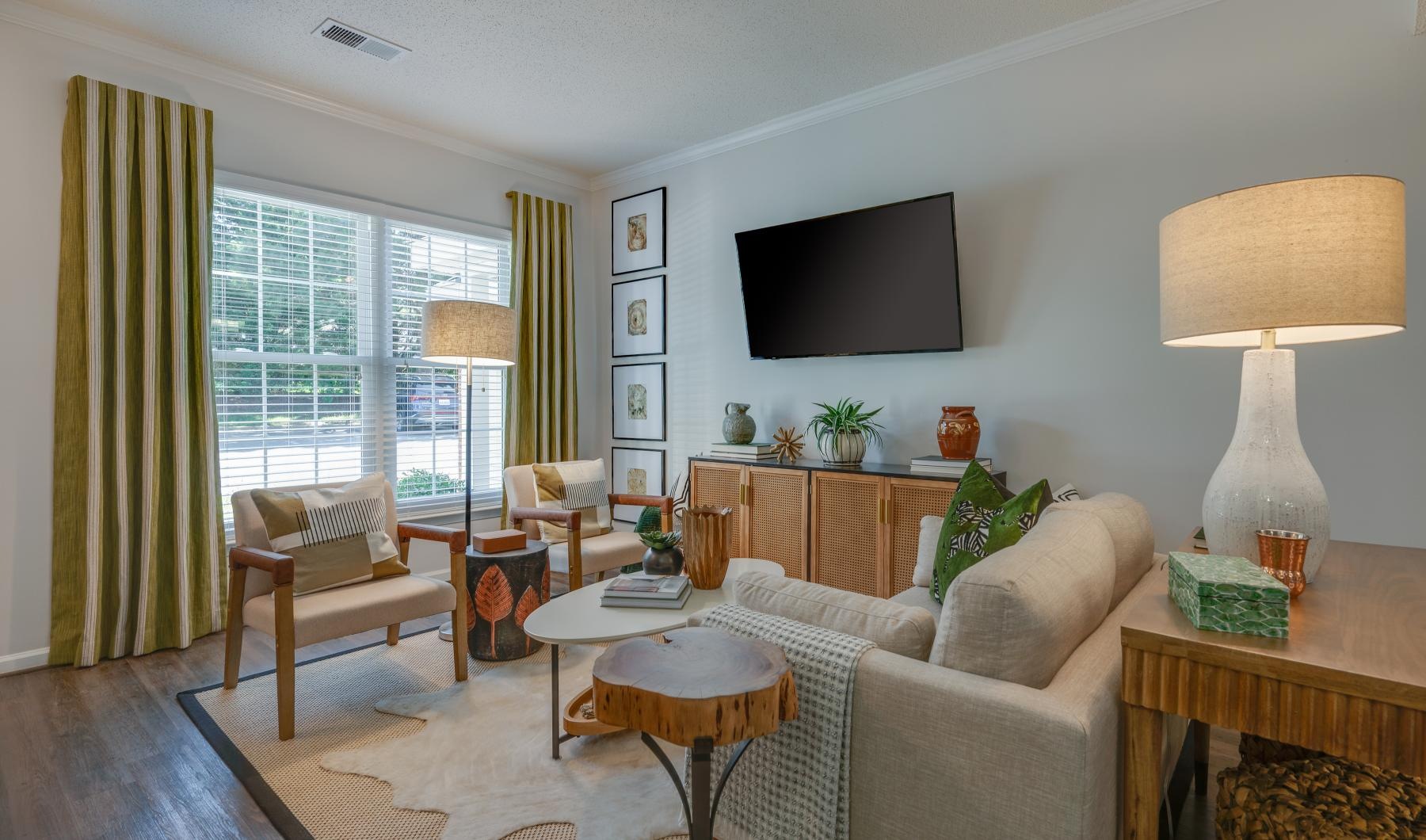 Bedroom options to fit every lifestyle a living room with a tv and couches