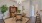 a dining room with a table and chairs
