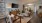 a living room with a tv and furniture