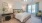 a bedroom with a large bed
