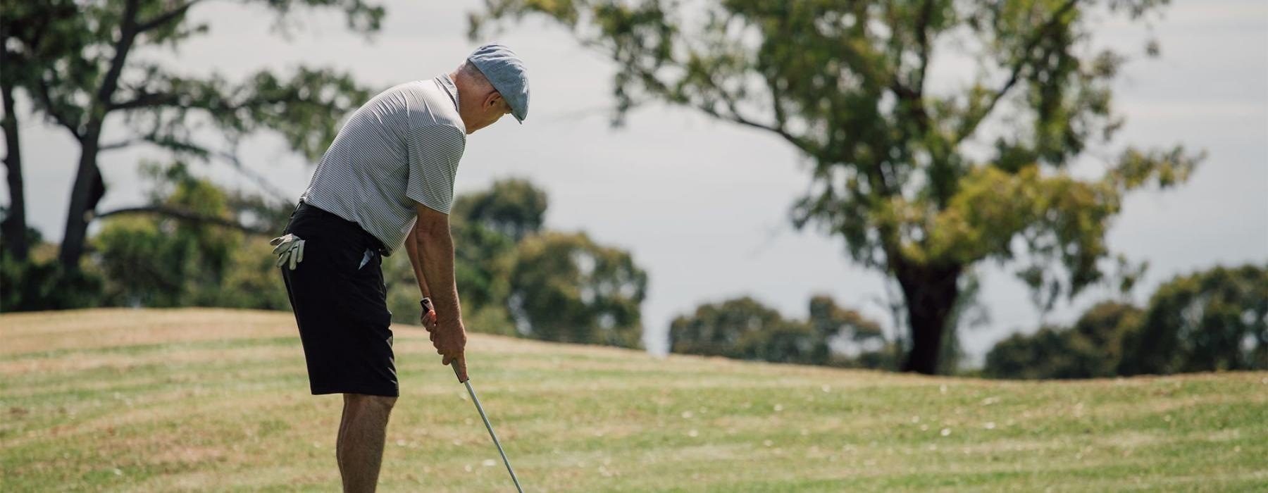 a man playing golf